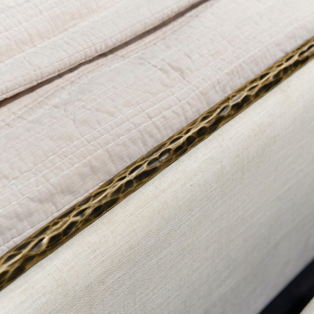 Hammered Metal Bed with Beige Upholstered Headboard